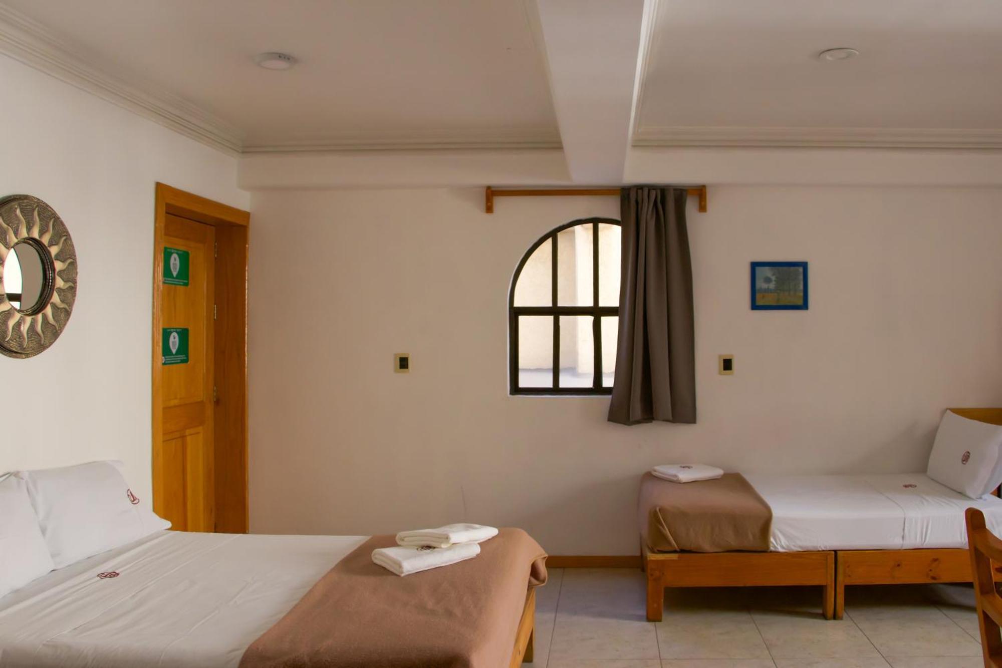 Suites Sevilla Puebla Exterior photo